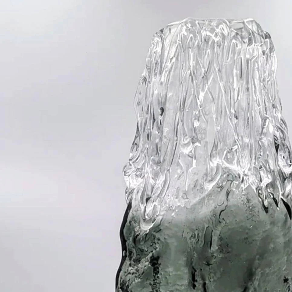 Hand blown smoked glass vase with unique rook texture, showcasing modern artisanal design.