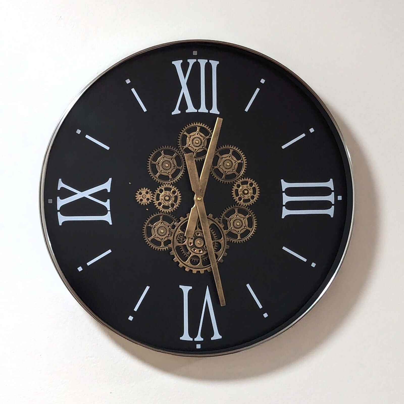 SOFI Modern Round Wall Clock with Exposed Gears, 60cmElevate your decor with SOFI's 60cm wall clock, featuring exposed gears & Roman numerals for industrial luxury.