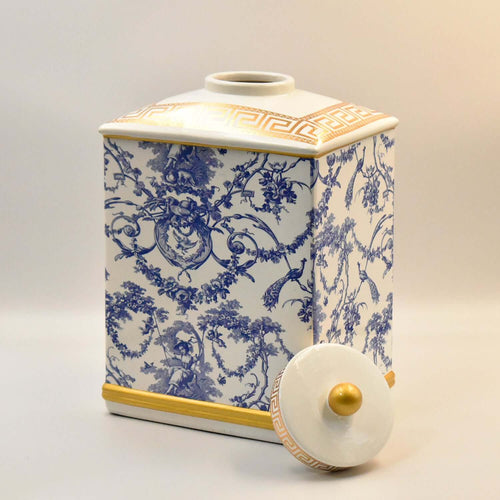 Decorative ceramic jar with blue floral pattern on a white background