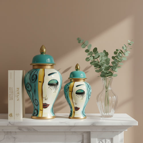 Large Art Deco Face Motif Ceramic Jar Set with distinct face designs on a mantel, showcasing modern artistic elegance in two sizes.