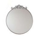 Elevate your space with the Baroque Silver Round Mirror. This 60x60 cm decorative wall mirror features a stunningly ornate silver frame, showcasing classic Baroque style influence. It adds vintage charm and sophistication, perfect as a silver accent mirro