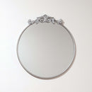 Elevate your space with the Baroque Silver Round Mirror. This 60x60 cm decorative wall mirror features a stunningly ornate silver frame, showcasing classic Baroque style influence. It adds vintage charm and sophistication, perfect as a silver accent mirro
