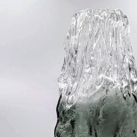 Hand blown smoked glass vase with unique rook texture, showcasing modern artisanal design.