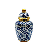 Modern decorative ginger jar blue white gold on entryway table