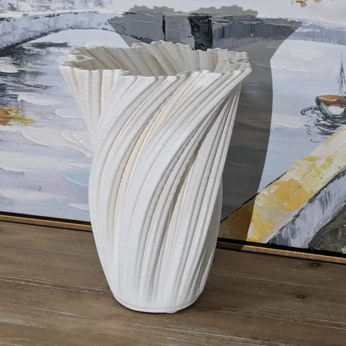 Discover the Ornamental 3D Printed Ceramic Vase (29cm), a modern sculpture born from innovative 3D printing technology. Expertly crafted from premium white porcelain, its intricate, artistic form and elegant finish make it a stunning contemporary home dec
