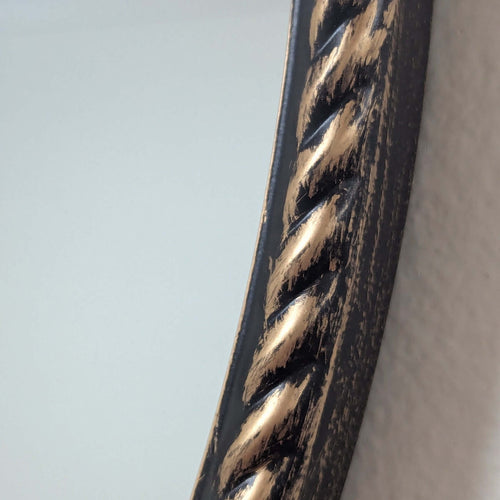 Elevate your space with this Ornate Baroque Round Wall Mirror. Featuring a detailed aged gold frame and intricate motifs, this 60cm circular mirror exudes vintage European elegance and antique charm. Perfect as a decorative accent or statement piece in li