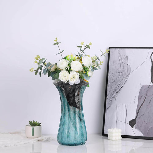 Seashell Marble Effect Porcelain Vase – Sculptural, 36cmTransform your home with a 36cm vase blending coastal charm and elegance. Available in Blue, Grey, Gold & Black.