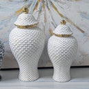 Elegant white and gold ceramic ginger jar set with textured lids, ideal for home decor in vintage Hamptons style.