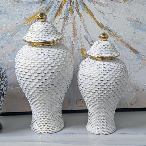 Ginger Jar Set Elegant White & Gold | Ceramic Vases with textured gold lids on a display shelf, perfect for vintage Hamptons style decor.